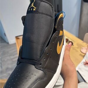 Nike Air Jordan 1 Low Black with Gold Swoosh